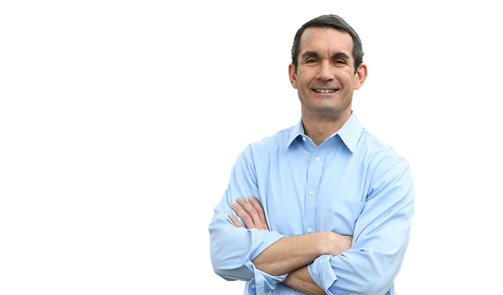 Eugene DePasquale standing resolutely, embodying strength and determination as he runs for Pennsylvania Attorney General.
