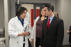 Eugene DePasquale discussing healthcare issues with a concerned doctor, focusing on protecting Pennsylvanians' rights.